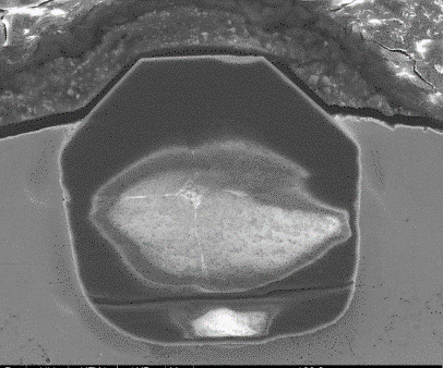 Cross-section of diamond and BSL metal bond.