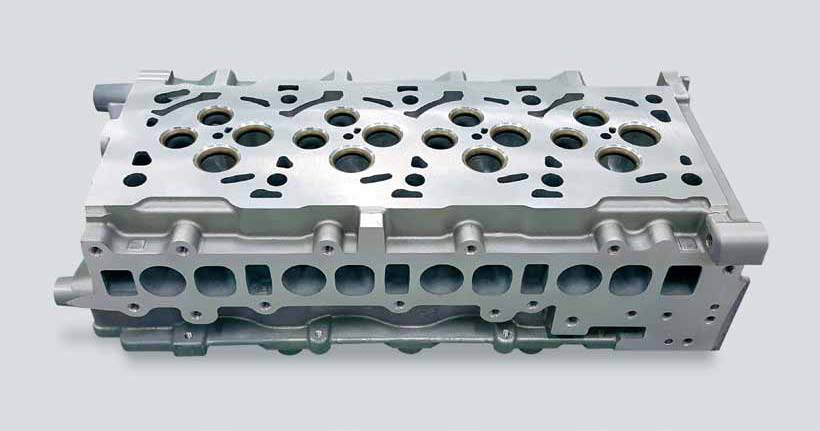 Aluminium-Zylinderkopf: Ventil- und Planflächen: Bauteil- und Bearbeitungsansicht.
