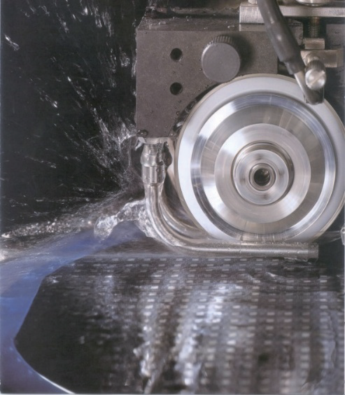 Original photograph of machining with coolant supply.