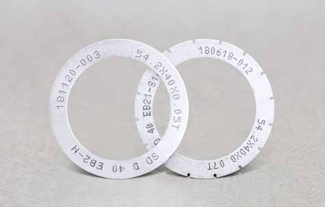 Electroformed, free-standing microblades; markings on the original tools are retained.