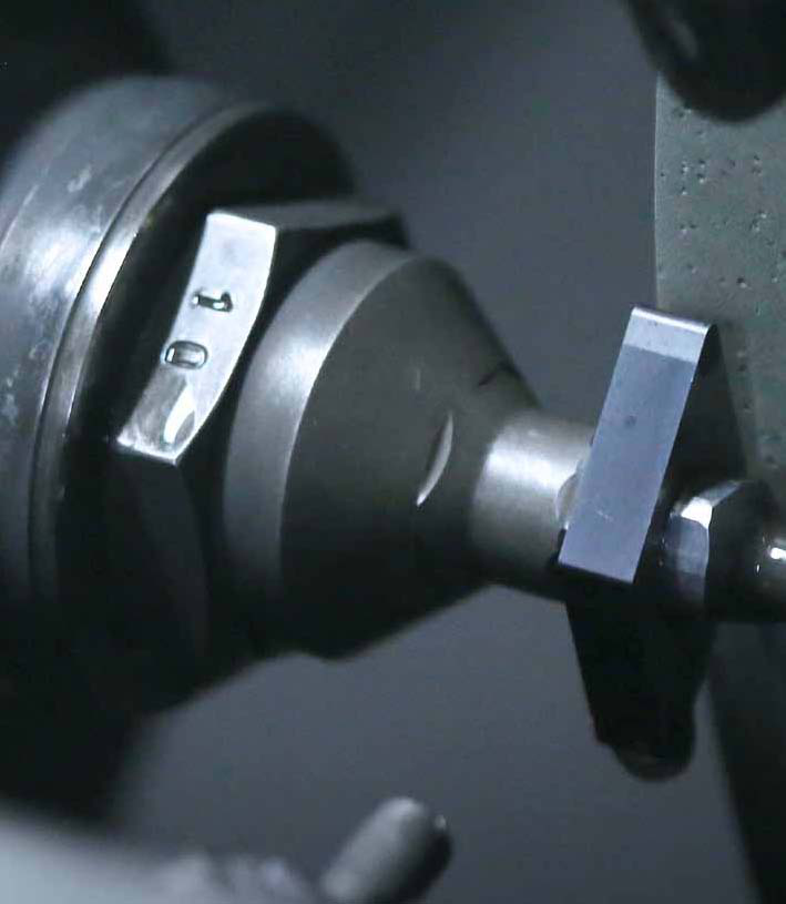 Insert and grinding wheel during machining.