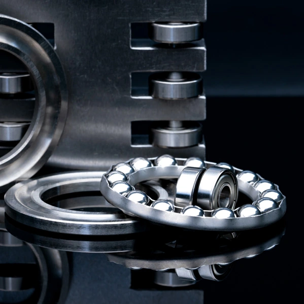 Lager- und Maschinenanwendung im Wear-Parts-Produktblatt: Anwendungsbild mit Kugellagern und Axialkugelkranz.